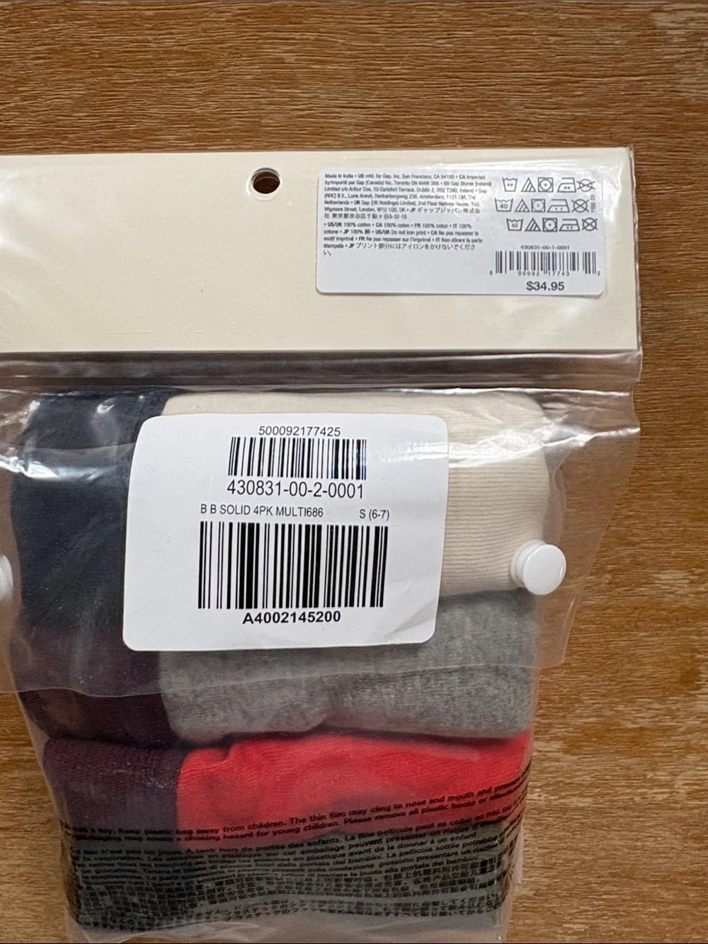 GAP Kids 4-Pack Briefs in Cream, Gray, Red, and Dark Green. NEW WITH TAGS. 6-7